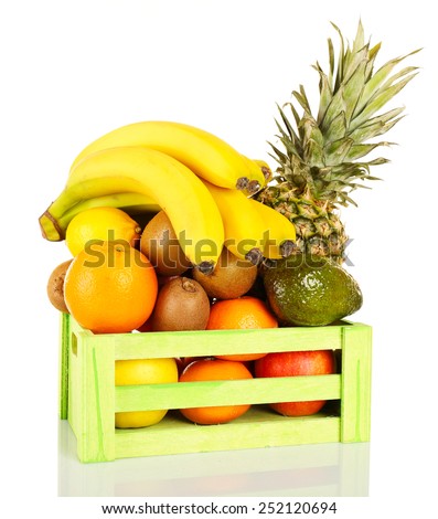 Assortment of exotic fruits in box isolated on white