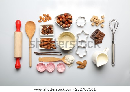 Food ingredients and kitchen utensils for cooking isolated on white
