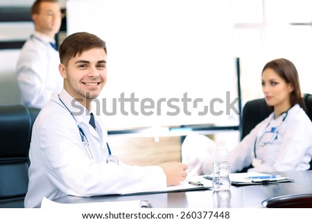 Medical workers working in conference room