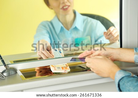 Teller window with working cashier