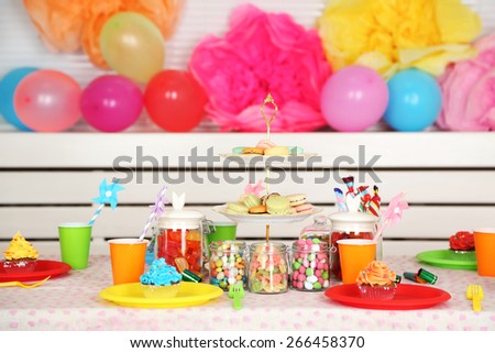 Prepared birthday table with sweets for children party