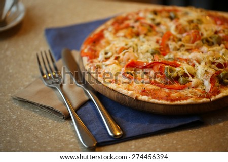 Delicious pizza on table close up