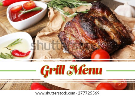 Delicious grilled meat on paper on table and space for text