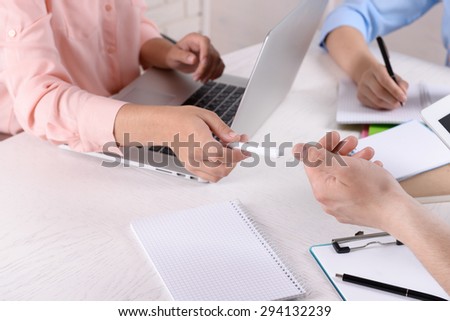Work process of business meeting with electronic devices in office