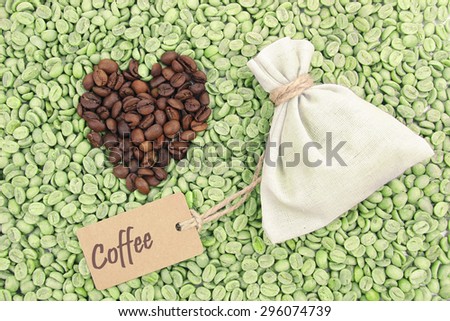 Sack with coffee on green coffee beans background