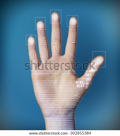 Human palm with microchip picture on it on dark blue background