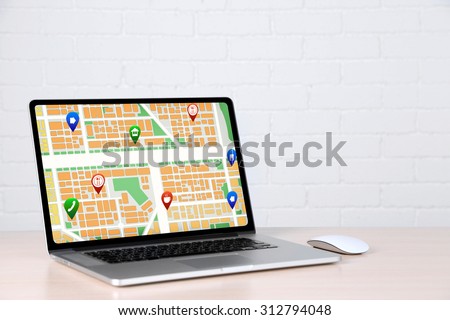 Modern laptop with map gps navigation application