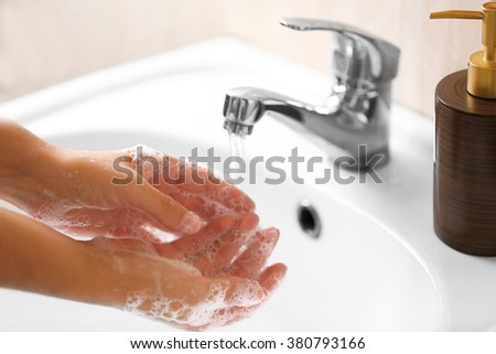 Washing of hands with soap under running water Stock foto © 