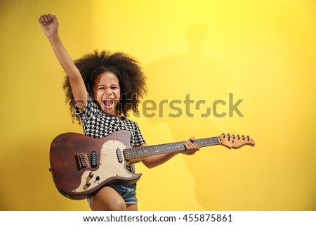 Image, Stock Photo Child playing guitar