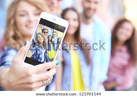 Similar – Foto Bild Männerporträt, das ein Selfie im Schatten macht