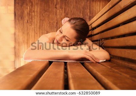 Similar – Image, Stock Photo a wooden sauna from the inside with a man taking a sauna