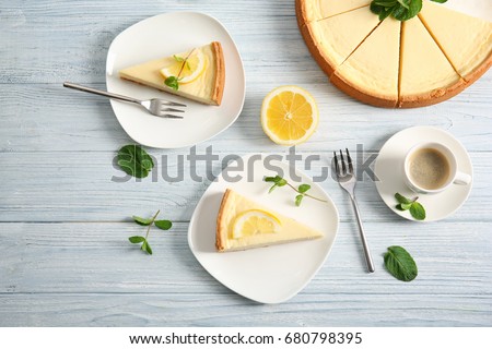 Similar – Image, Stock Photo Cheesecake slice with lemon syrup topping. Slice of cheesecake close-up