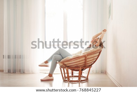 Similar – Image, Stock Photo Happy woman resting on bed with headphones