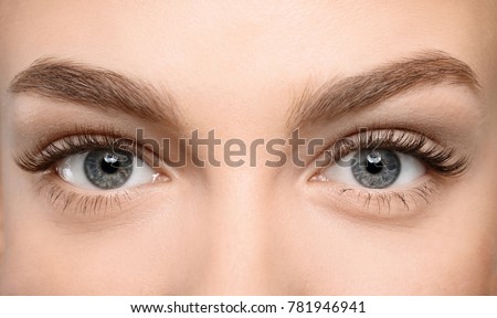 Similar – Image, Stock Photo Young woman with eyes closed standing near wall