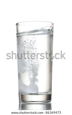 Glass with efervescent tablet in water isolated on white Imagine de stoc © 