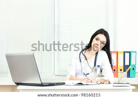 beautiful girl doctor in the office