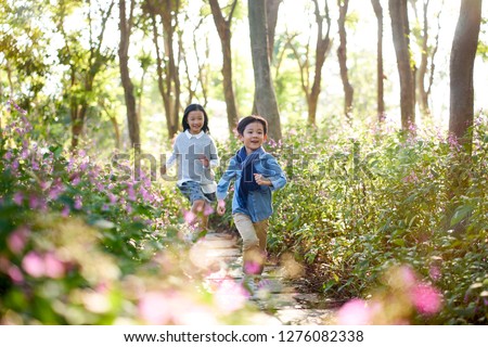 Similar – Image, Stock Photo Little boy with flower in the hands