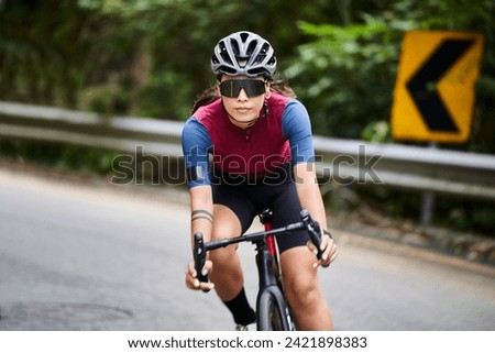 Similar – Image, Stock Photo Female cyclist in helmet practicing on training track