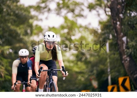 Similar – Image, Stock Photo Female cyclist in helmet practicing on training track