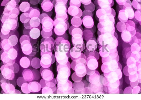 Circle or bokeh pink caused by many bulbs.