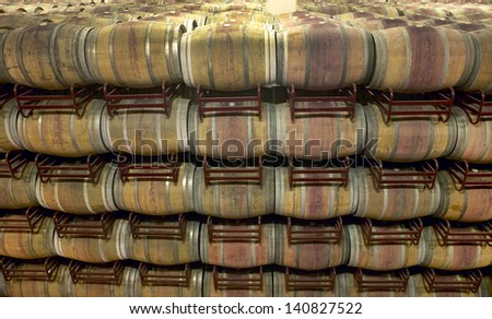 Wine barrels in an aging process at spanish cellar