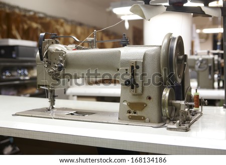 Detail of professional sewing machine in a factory
