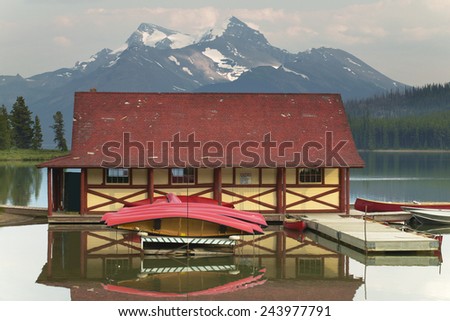 Canadian landscape with Maligne lake and canoes. Jasper. Alberta. Horizontal