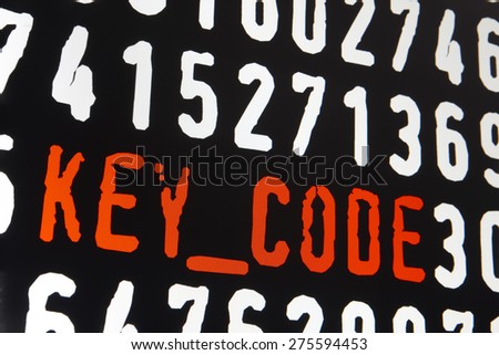 Computer screen with key code text on black background. Horizontal