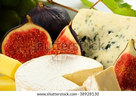 Various types of cheese and fruits