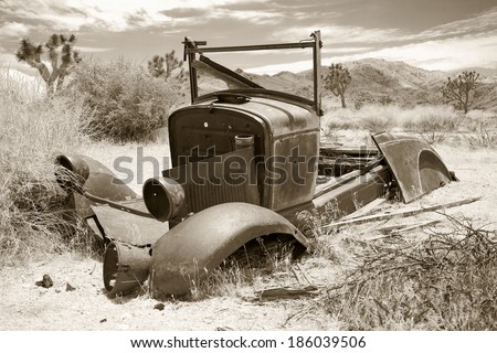 Abandoned auto in the desert