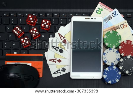 online casino games concept computer and smart phone
