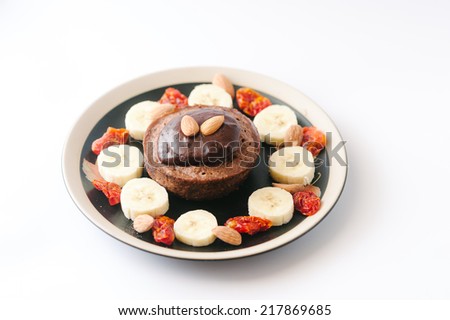 Handmade breakfast chocolate souffle and fruits on white background