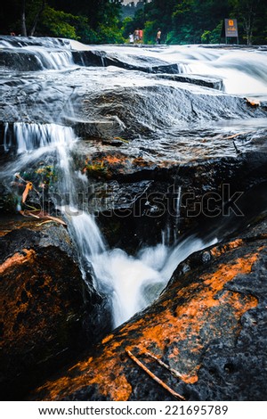 Beautiful deep rock and waterfall nature wallpaper