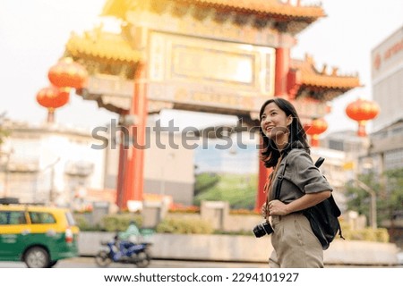 Similar – Image, Stock Photo Asian female traveler walking at old city