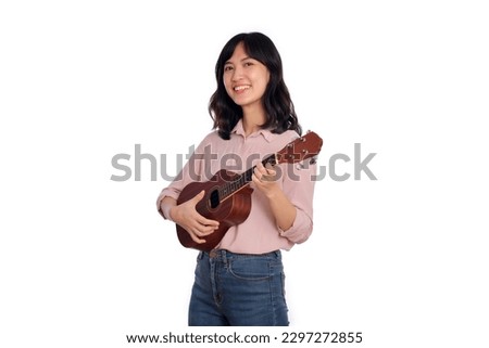 Similar – Image, Stock Photo young woman playing ukulele