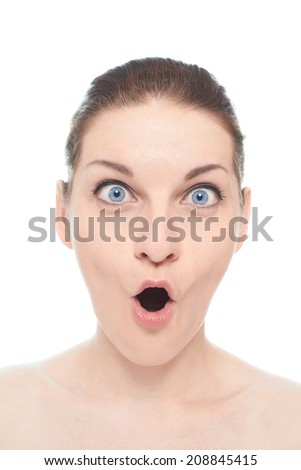 Young caucasian woman portrait with a surprised or bemused happy facial expression, isolated over the white background, natural make up and postprocessing