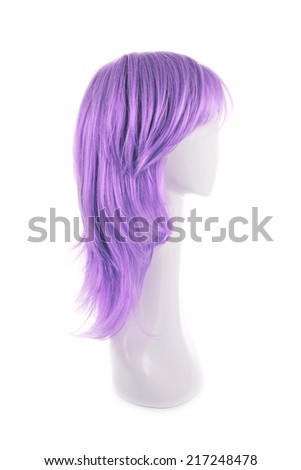 Wavy hair wig over the white plastic mannequin head isolated over the white background