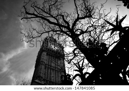 Big Ben against cloudy sky, black and white view