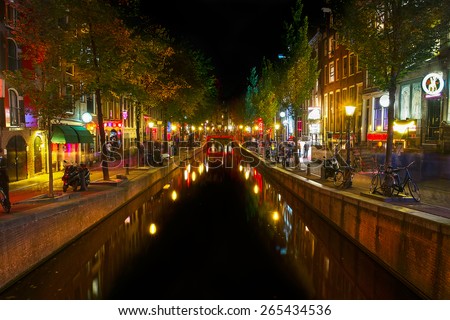 AMSTERDAM, NETHERLANDS - SEPTEMBER, 2014: Red light district, prostitution in the Netherlands is legal and regulated.