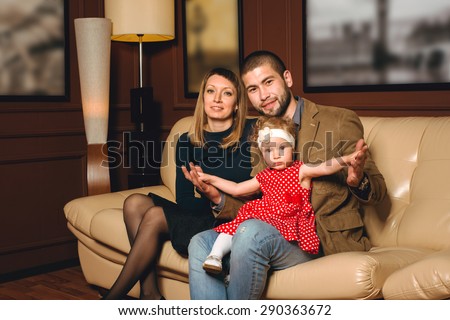 Portrait of a happy family, photo studio