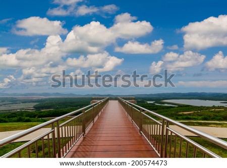 Wooden bridge with beautiful landscape on mountain with nice sky,thailand