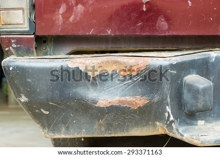 A car has a dented rear bumper after an accident/Damage/Car Accident