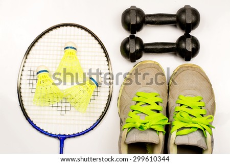 sport shoe and badminton on white background