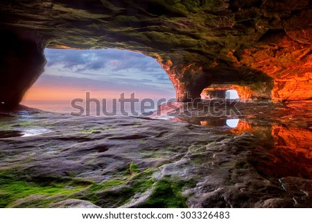 Lake Superior Sea Cave at Sunset - The Pictured Rocks area near Munising Michigan has many interesting formations along it\'s shoreline.