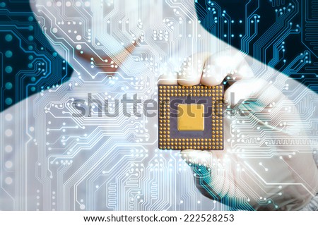 scientist in jumpsuit holding microchip and electronics circuit glow