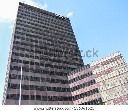 BILBAO, SPAIN - APRIL 13: The modern building of the BBVA Bank in the Gran Via Street of Bilbao. It is one of the most important bank in Spain. April 13, 2013 in BIlbao, Basque Country, Spain