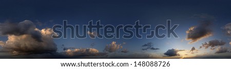 360 degree seamless panoramic skydome of a calm, yet dramatic evening with towering thunder clouds (cumulus nimbus) god rays and a warm blue sky
