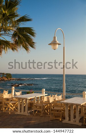 Outdoors cafe with sea view, Crete, Greece