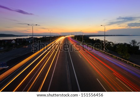 Highway to heaven - night road with light trails