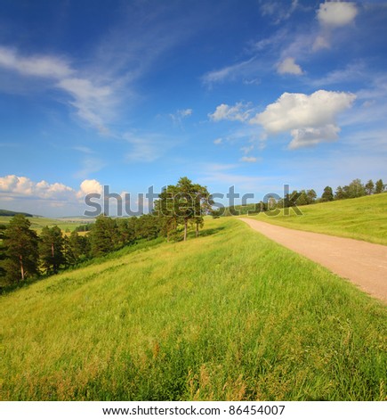 summer landscape with road on hills in Russia